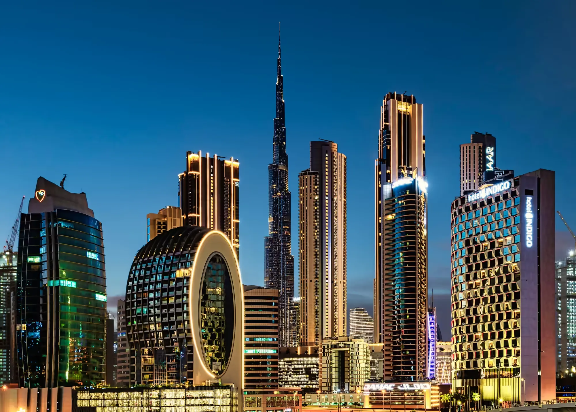 Dubai real estate myths investors — skyline view of Dubai Marina and Downtown from above